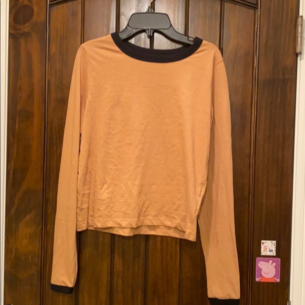 Orange long sleeved shirt